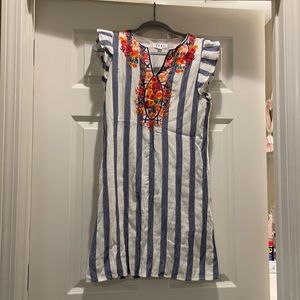 Striped dress with floral embroidery.